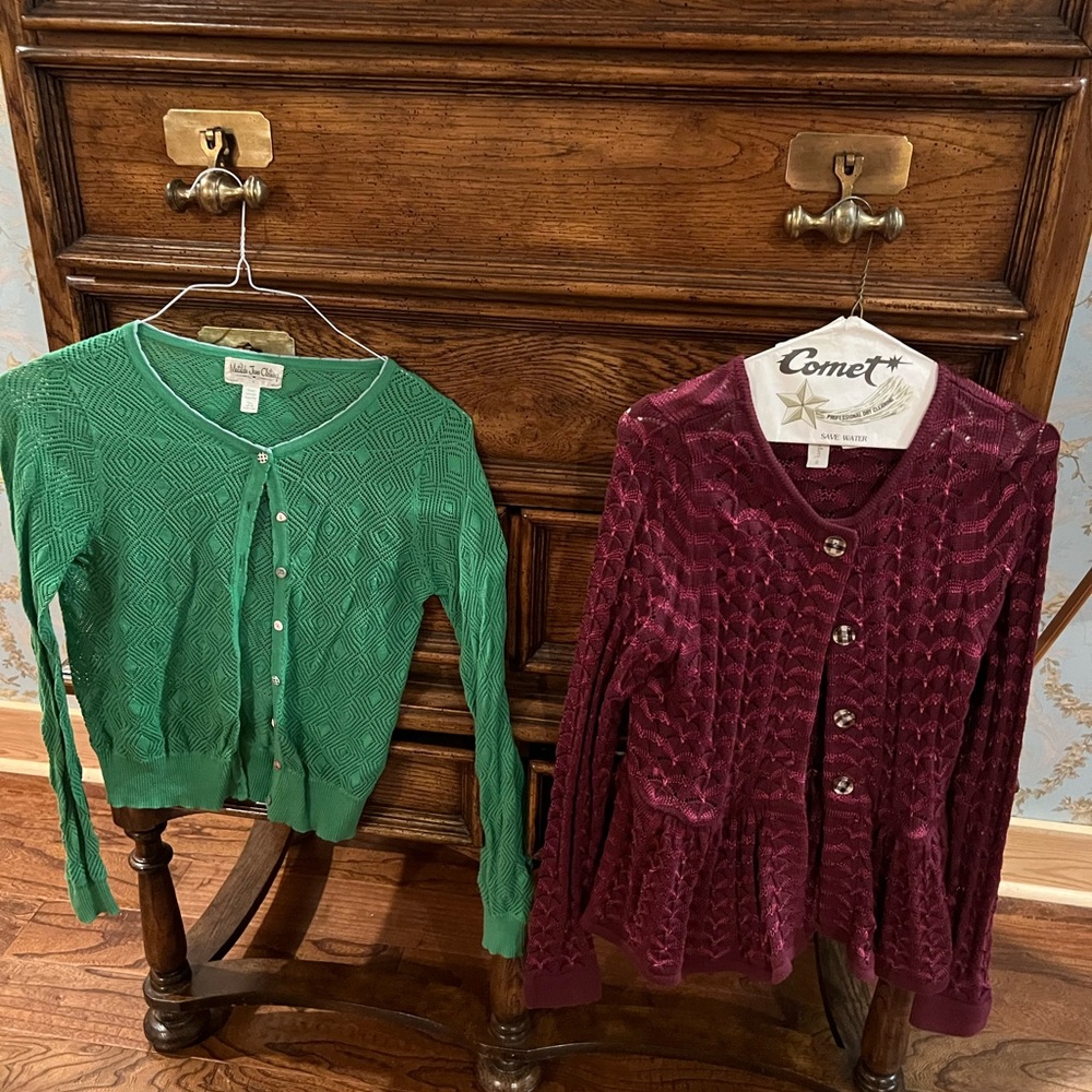 A bundle of two cardigans.